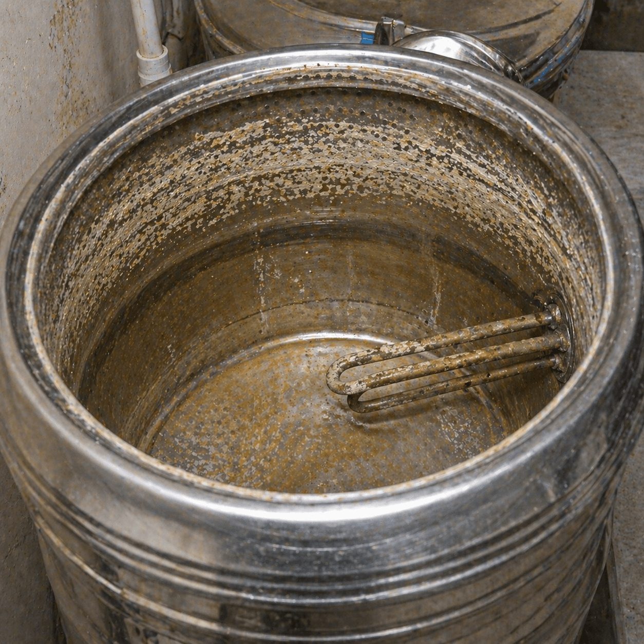White Chalky Layer on Immersion Rod: What It Is and How to Remove It